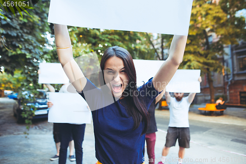 Image of Group of protesting young people outdoors