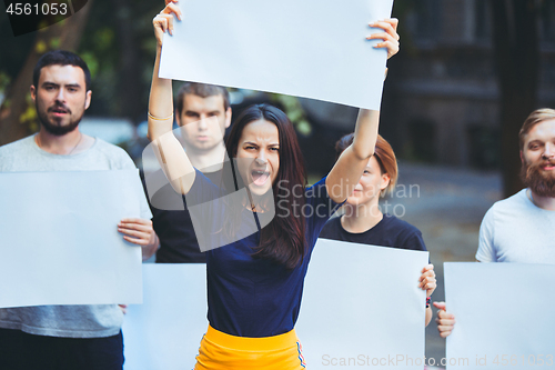 Image of Group of protesting young people outdoors