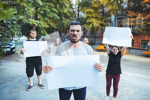 Image of Group of protesting young people outdoors