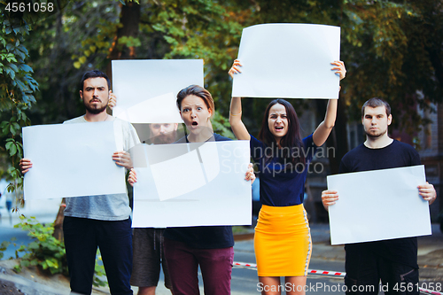 Image of Group of protesting young people outdoors