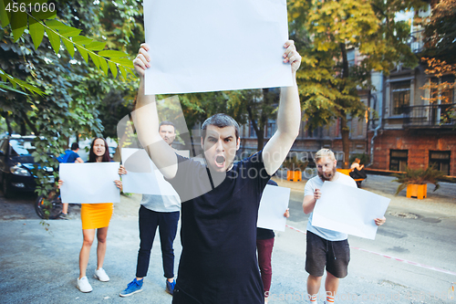 Image of Group of protesting young people outdoors