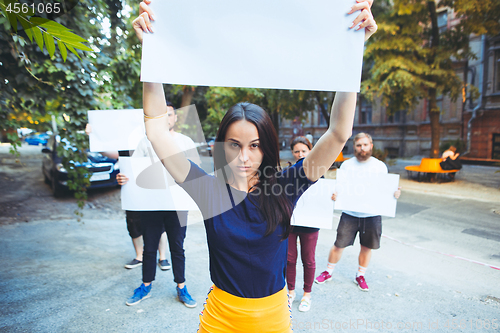 Image of Group of protesting young people outdoors