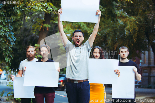 Image of Group of protesting young people outdoors