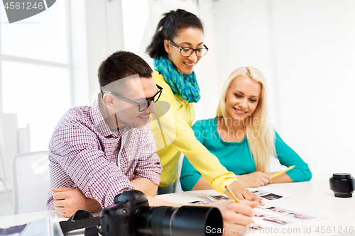 Image of photographers with camera at photo studio