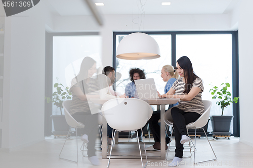 Image of Startup Business Team At A Meeting at modern office building