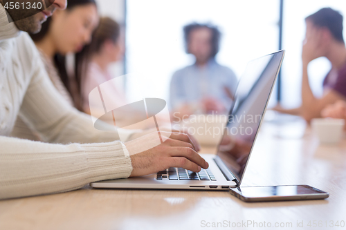 Image of Startup Business Team At A Meeting at modern office building