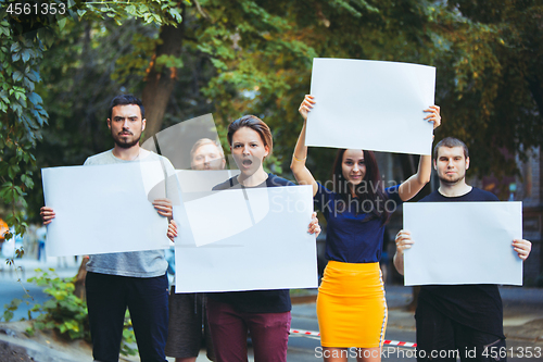 Image of Group of protesting young people outdoors