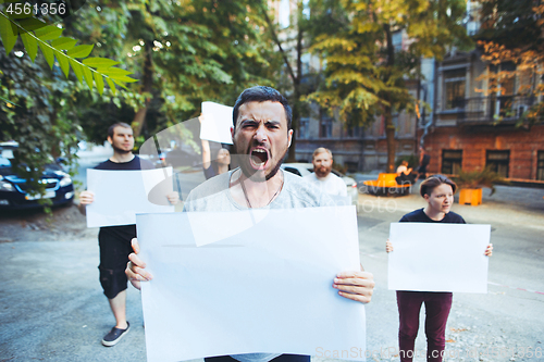 Image of Group of protesting young people outdoors