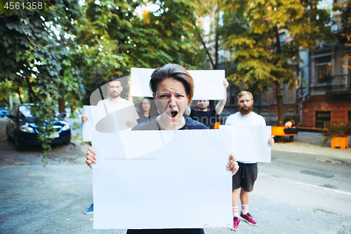 Image of Group of protesting young people outdoors