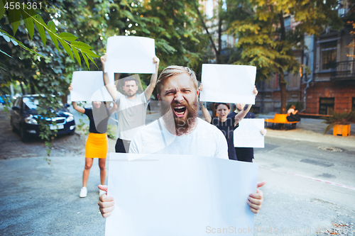 Image of Group of protesting young people outdoors