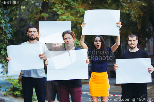 Image of Group of protesting young people outdoors