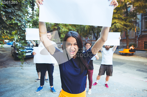 Image of Group of protesting young people outdoors