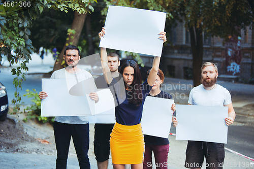 Image of Group of protesting young people outdoors