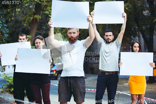 Image of Group of protesting young people outdoors