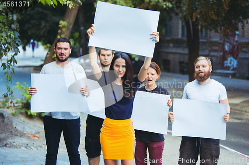 Image of Group of protesting young people outdoors