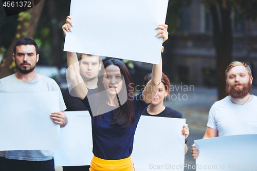 Image of Group of protesting young people outdoors