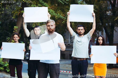 Image of Group of protesting young people outdoors