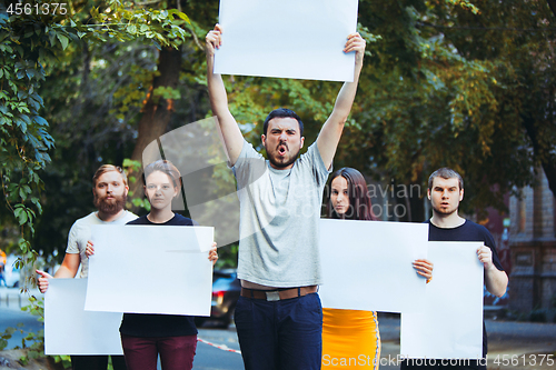 Image of Group of protesting young people outdoors