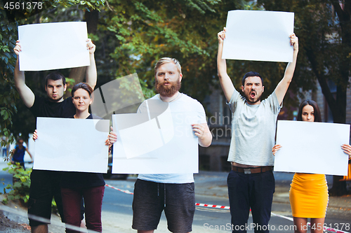 Image of Group of protesting young people outdoors