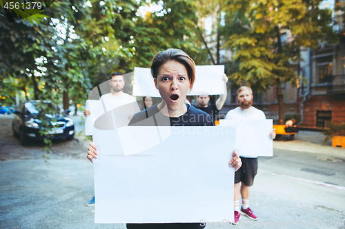 Image of Group of protesting young people outdoors