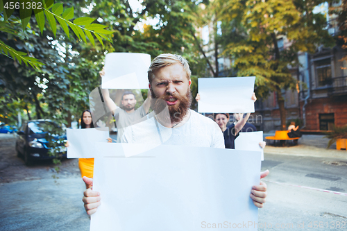 Image of Group of protesting young people outdoors