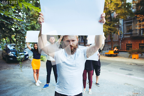 Image of Group of protesting young people outdoors