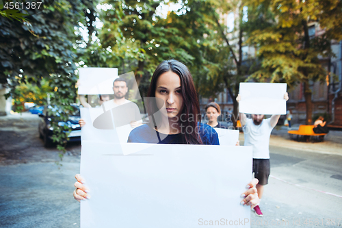 Image of Group of protesting young people outdoors