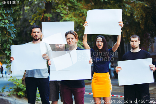 Image of Group of protesting young people outdoors