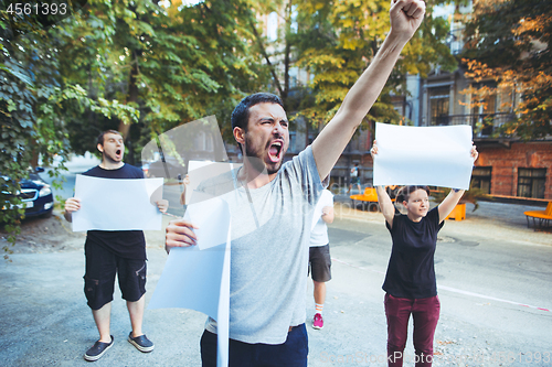 Image of Group of protesting young people outdoors