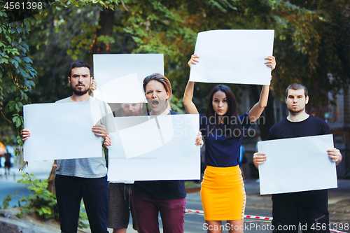 Image of Group of protesting young people outdoors