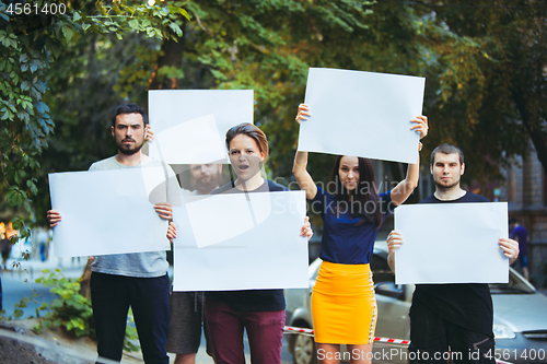 Image of Group of protesting young people outdoors