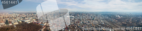 Image of KIEV, UKRAINE - April 06, 2018: Panoramic view of the city of Kiev with the stadium and university against the sky. Aerial view from the drone