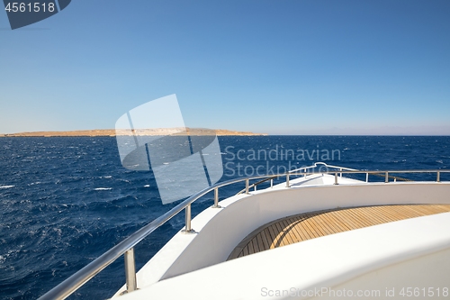 Image of Boat heading towards the horizon