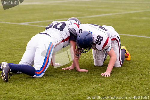 Image of professional american football players training