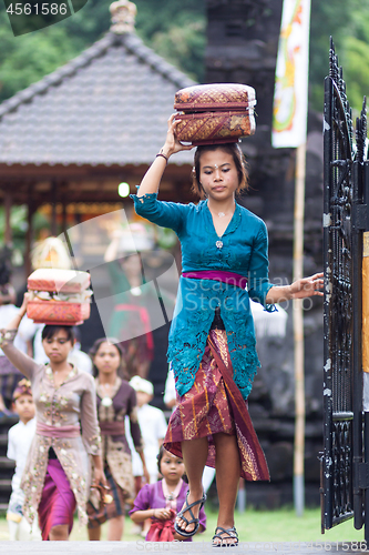 Image of Bali, Indonesia - Feb 2, 2012 - Hari Raya Galungan and Umanis Galungan holiday fesival parade - the days to celebrate the victory of Goodness over evil, on February 2nd 2012 on Bali, Indonesia