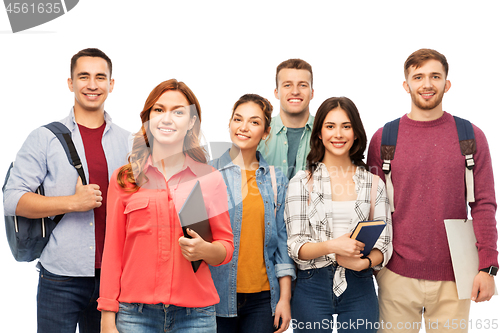 Image of group of smiling students with books