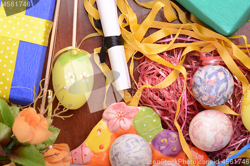 Image of Handcrafted easter eggs close up, ribbons and decoration