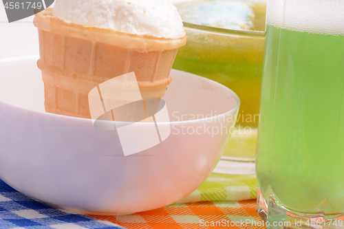 Image of Vanilla Ice Cream in bowl Homemade Organic product. Green Juice