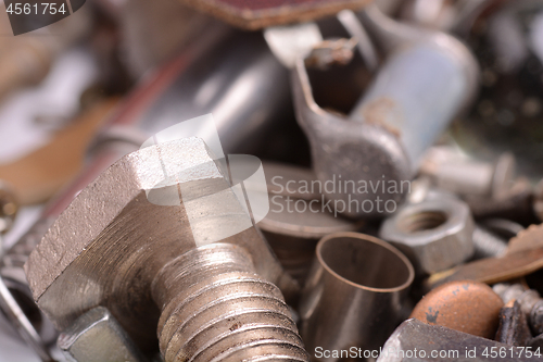 Image of old rusty screw,nuts and bolt with vintage style, close up