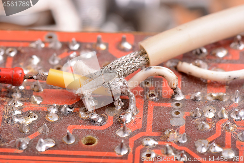 Image of Close up of an old electronic circuit board