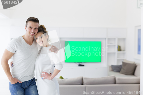 Image of couple hugging in their new home