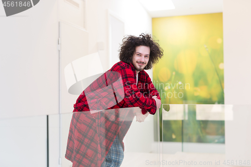 Image of portrait of young man in bathrobe