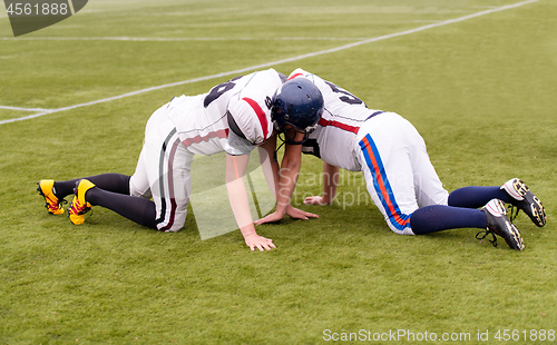 Image of professional american football players training