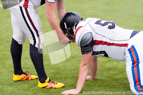 Image of professional american football players training