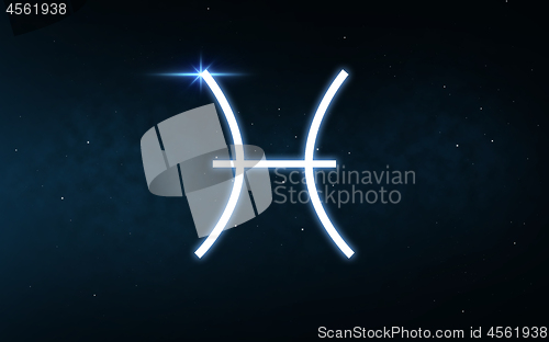 Image of pisces sign of zodiac over night sky and stars