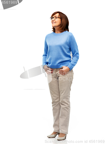 Image of senior woman in glasses over white background