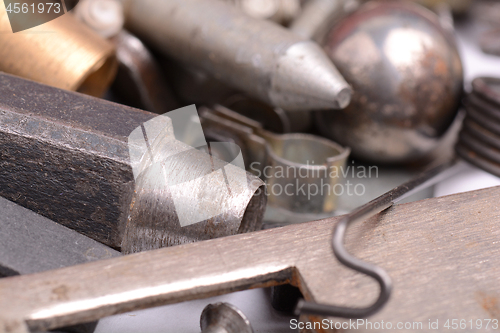 Image of old rusty screw,nuts and bolt with vintage style, close up