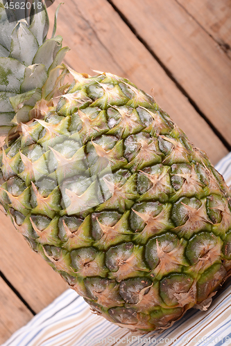 Image of Ripe whole pineapple close up