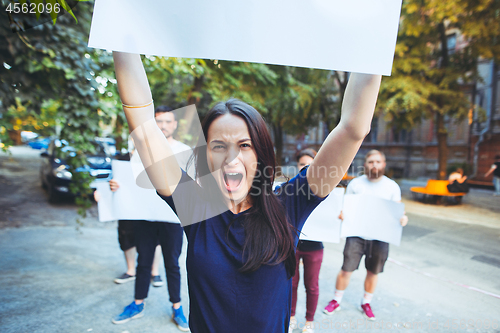 Image of Group of protesting young people outdoors