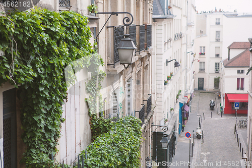 Image of Paris, France - May 22, 2012: View from the heights, to the street and houses of the city on a spring afternoon